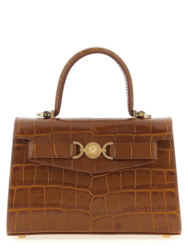 Medusa Hand Bags Brown sold by Wanan Luxury