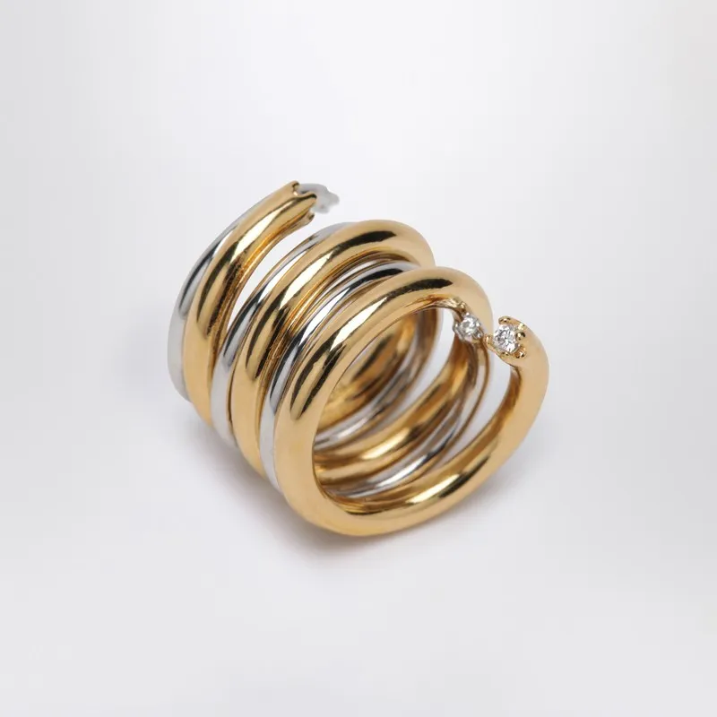Spiral Ring In Gold And Silver Tone made by Panconesi