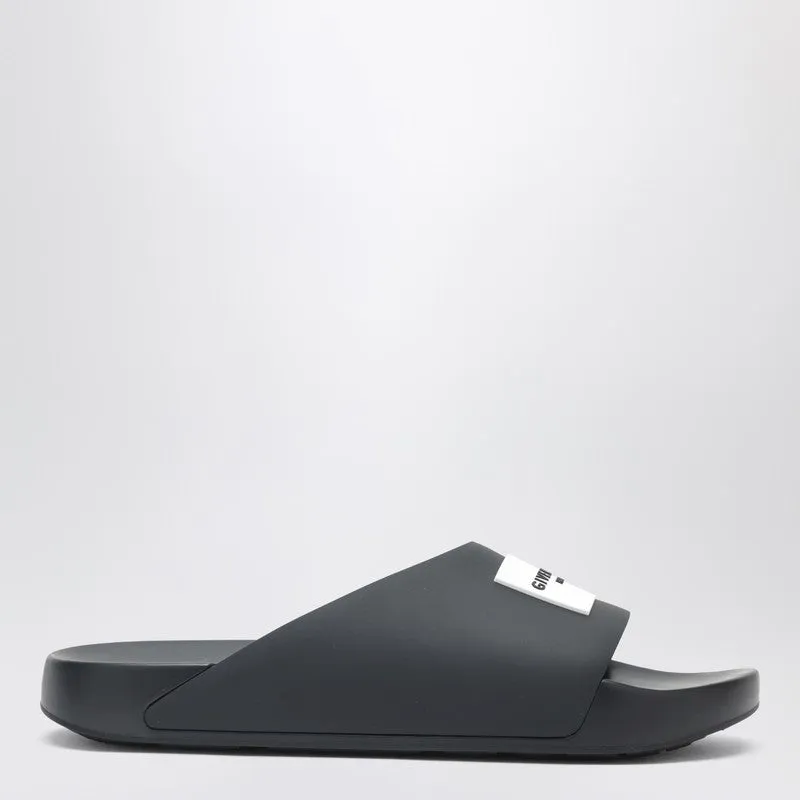 Label Flat Mules In Black Rubber sold by Wanan Luxury