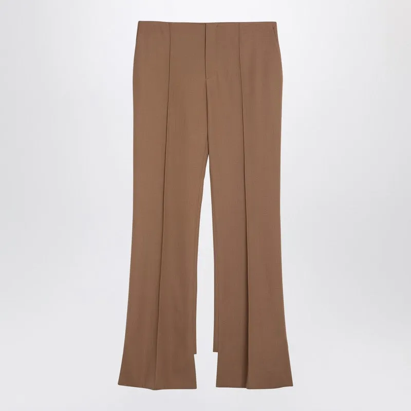 Beige Asymmetrical Wool Trousers sold by Wanan Luxury