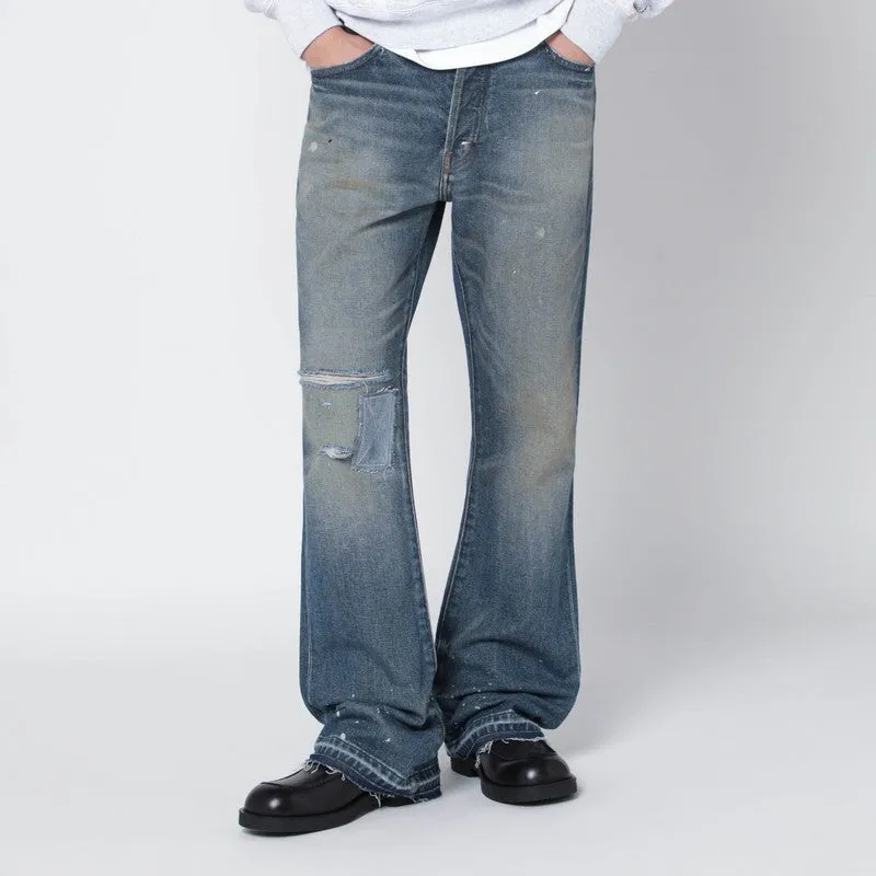 Faded Indigo Jeans With Rips sold by Wanan Luxury