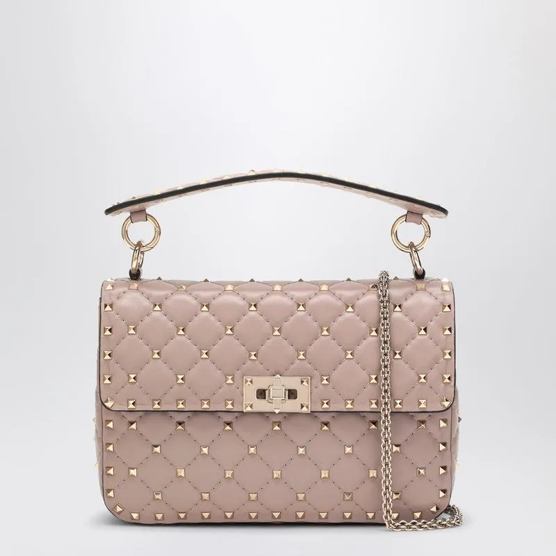 Medium Rockstud Spike Bag In Powder Pink made by Valentino