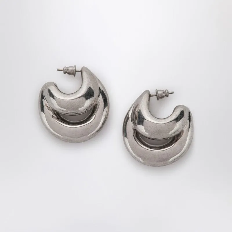 Blow Up Huggies Earrings In Silver Tone made by Panconesi