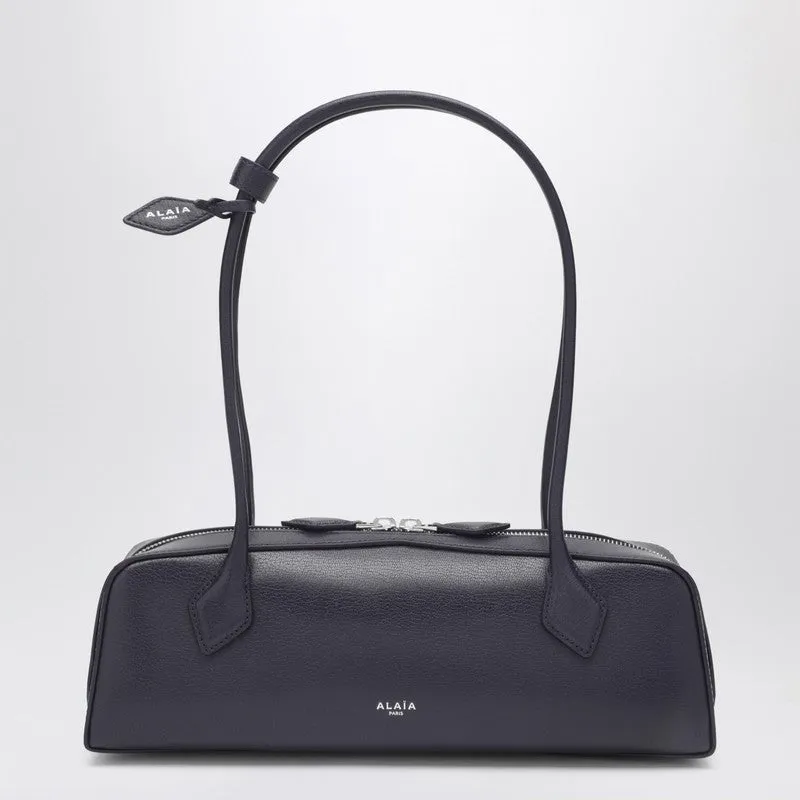 Le Teckel Medium Bag In Aubergine sold by Wanan Luxury