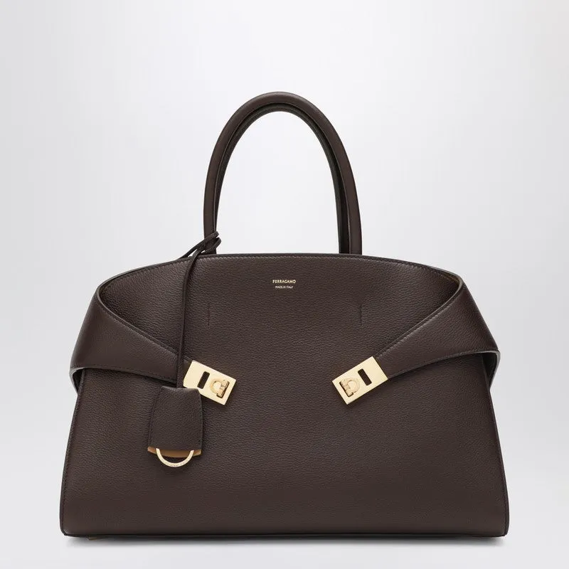 Hug M Leather Handbag In Brown/Ochre sold by Wanan Luxury