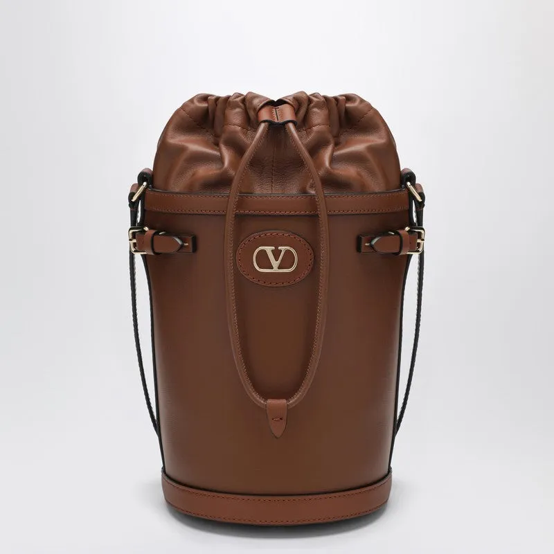 V Logo Signature Bucket Bag In Tobacco sold by Wanan Luxury