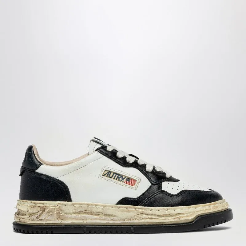 White/Black Sup Vint Sneaker sold by Wanan Luxury