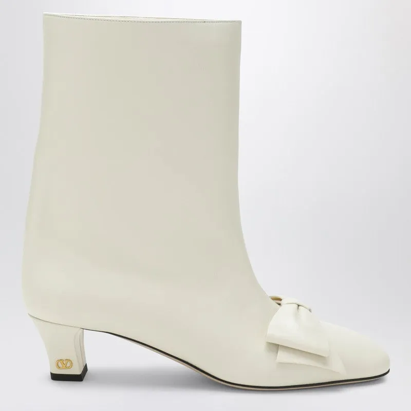 Ivory Bowow Ankle Boots sold by Wanan Luxury