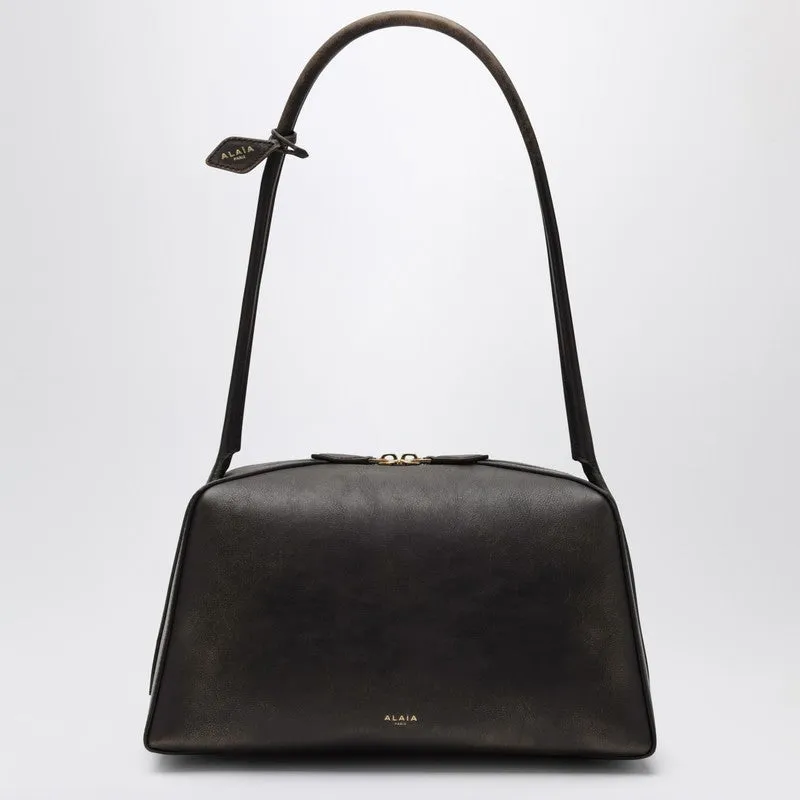 Le Bouledogue Bag In Ebony Aged Leather made by Alaia