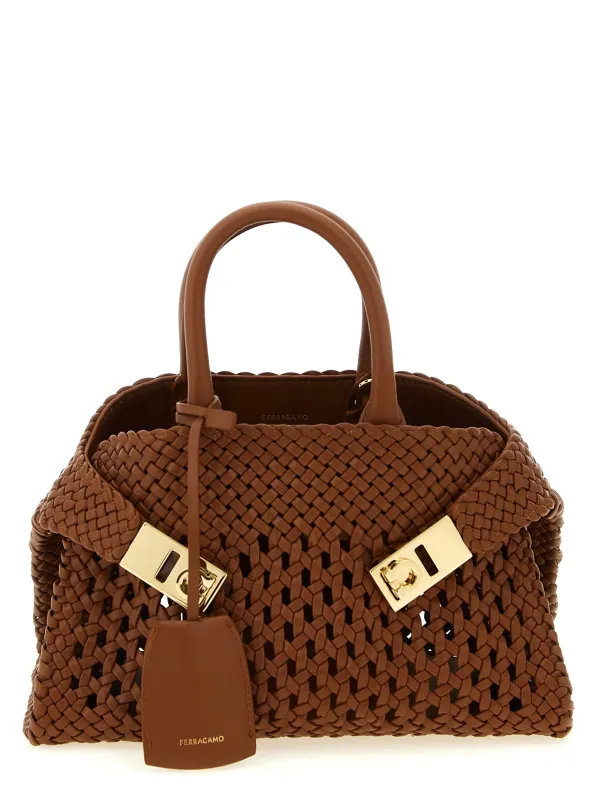 Hug Mini Hand Bags Brown made by Salvatore Ferragamo