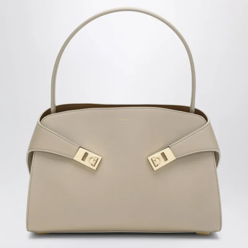 Ivory Hug Soft M Handbag In Leather made by Salvatore Ferragamo
