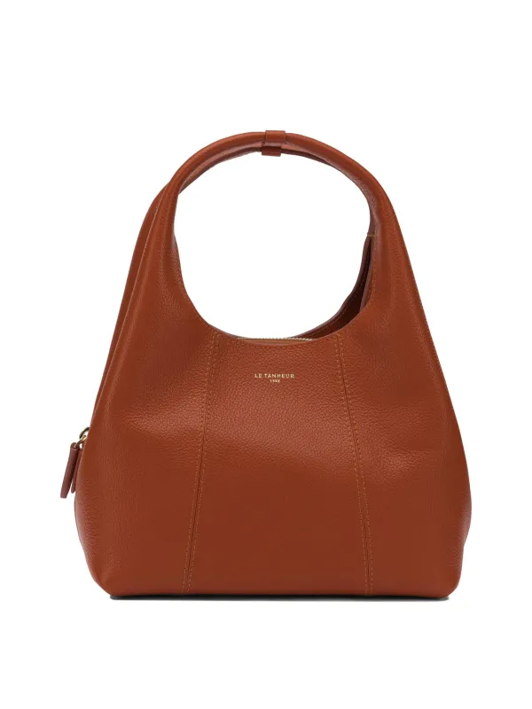 Handbags Orange made by Le Tanneur