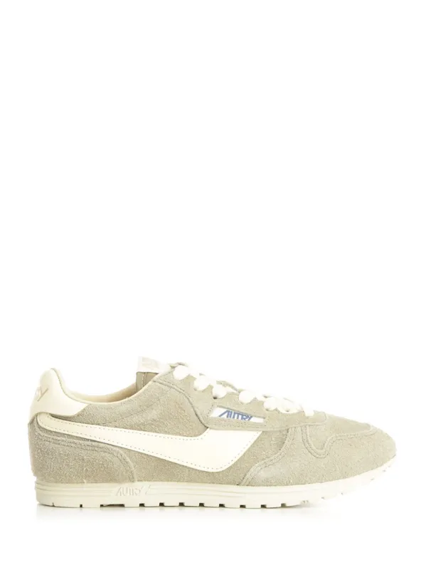 Windspin Sneaker In Perforated Leather Sneakers Green made by Autry