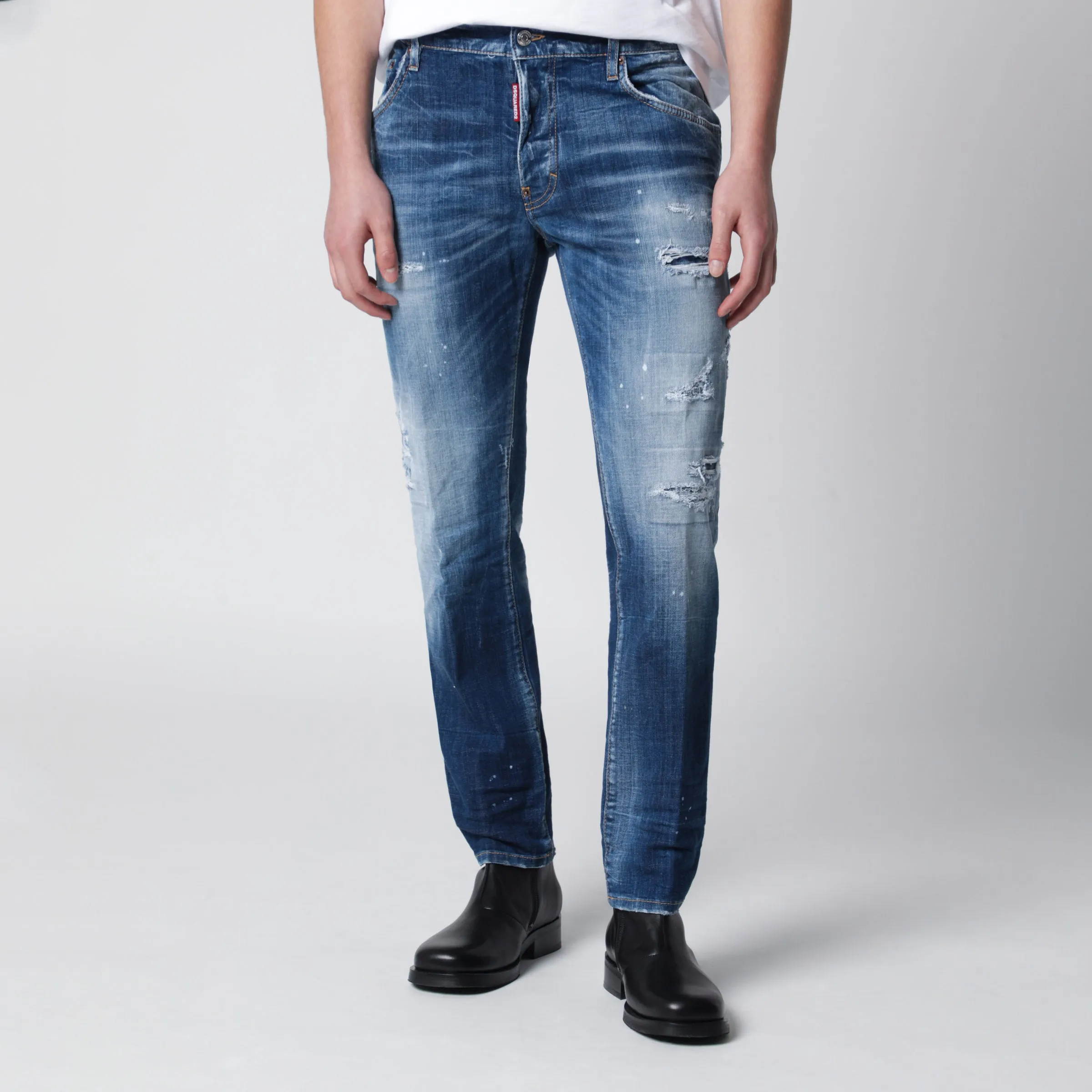 Skater Jeans In Medium Blue With Destroyed Details sold by Wanan Luxury