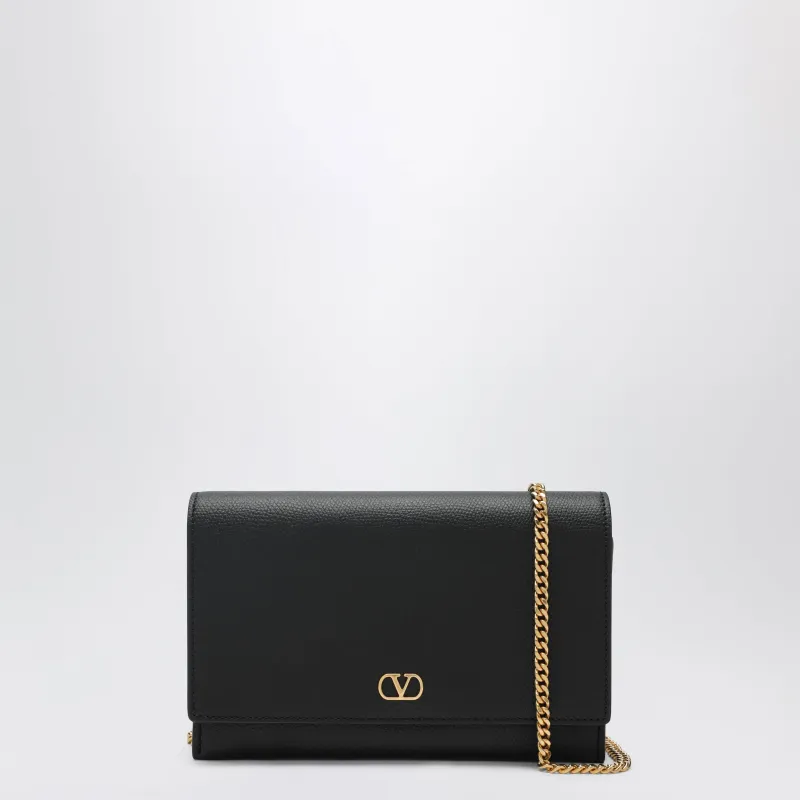 V Logo Signature Grained Calfskin Clutch In Black made by Valentino Garavani
