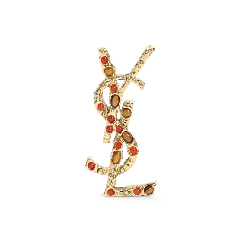 Pins made by Yves Saint Laurent