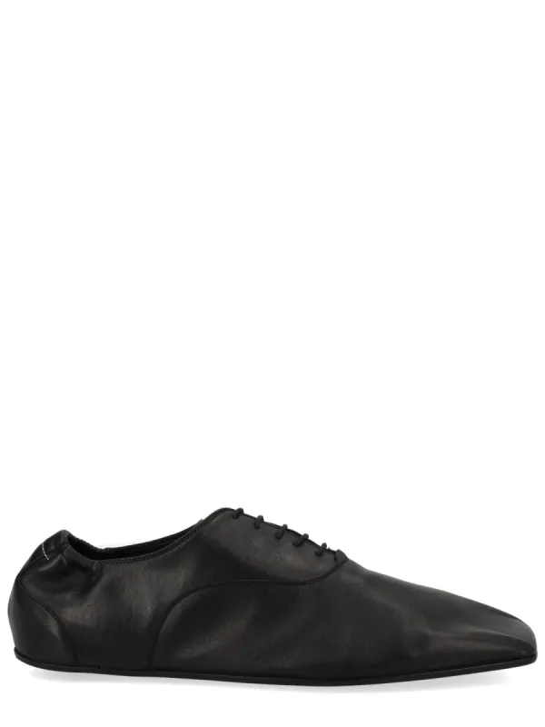 Scarpe "Travel Derby" made by Maison Margiela