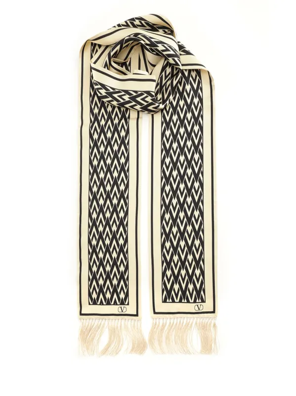 The V Scarves And Foulards Beige made by Valentino Garavani