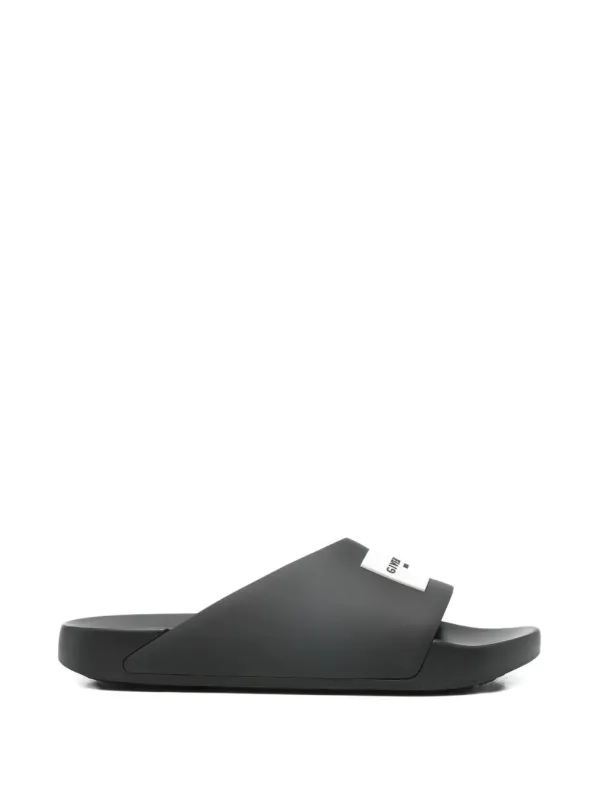 Label Slide Flat Mules In Rubber made by Givenchy