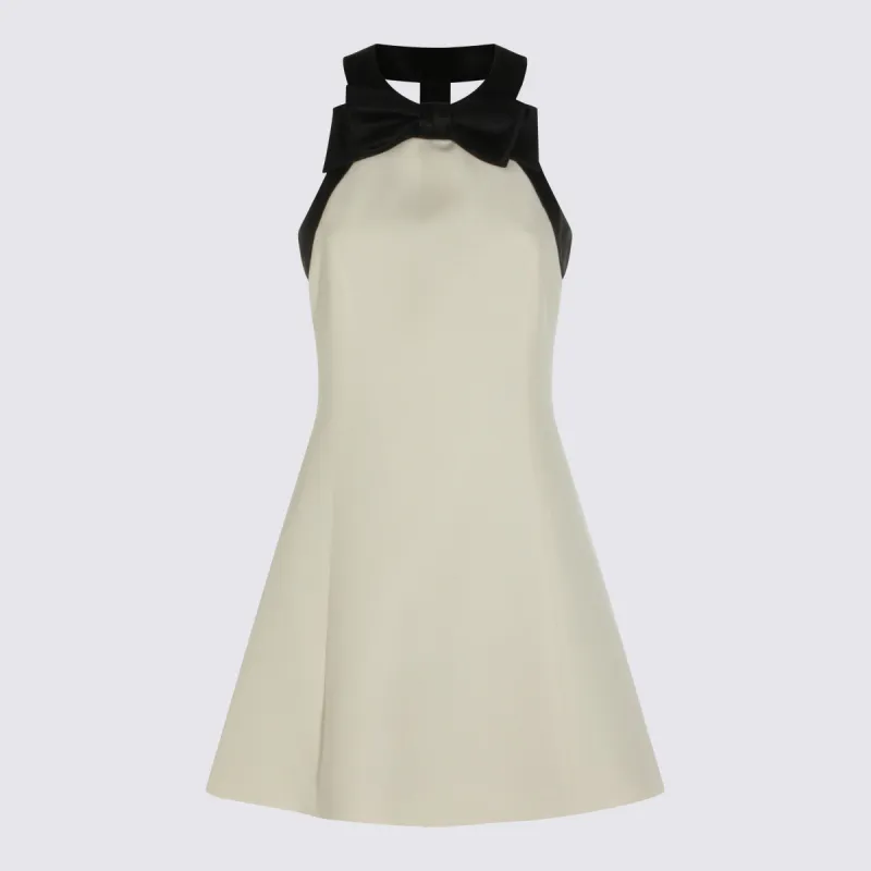 Dresses Vaniglia/Nero made by Valentino Garavani