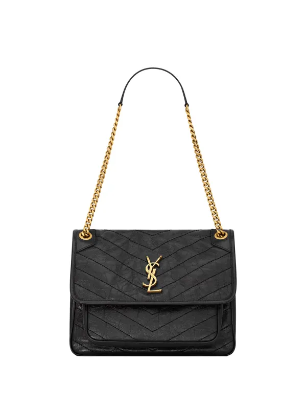 Niki Medium Soft Bag In Vintage Leather made by Yves Saint Laurent