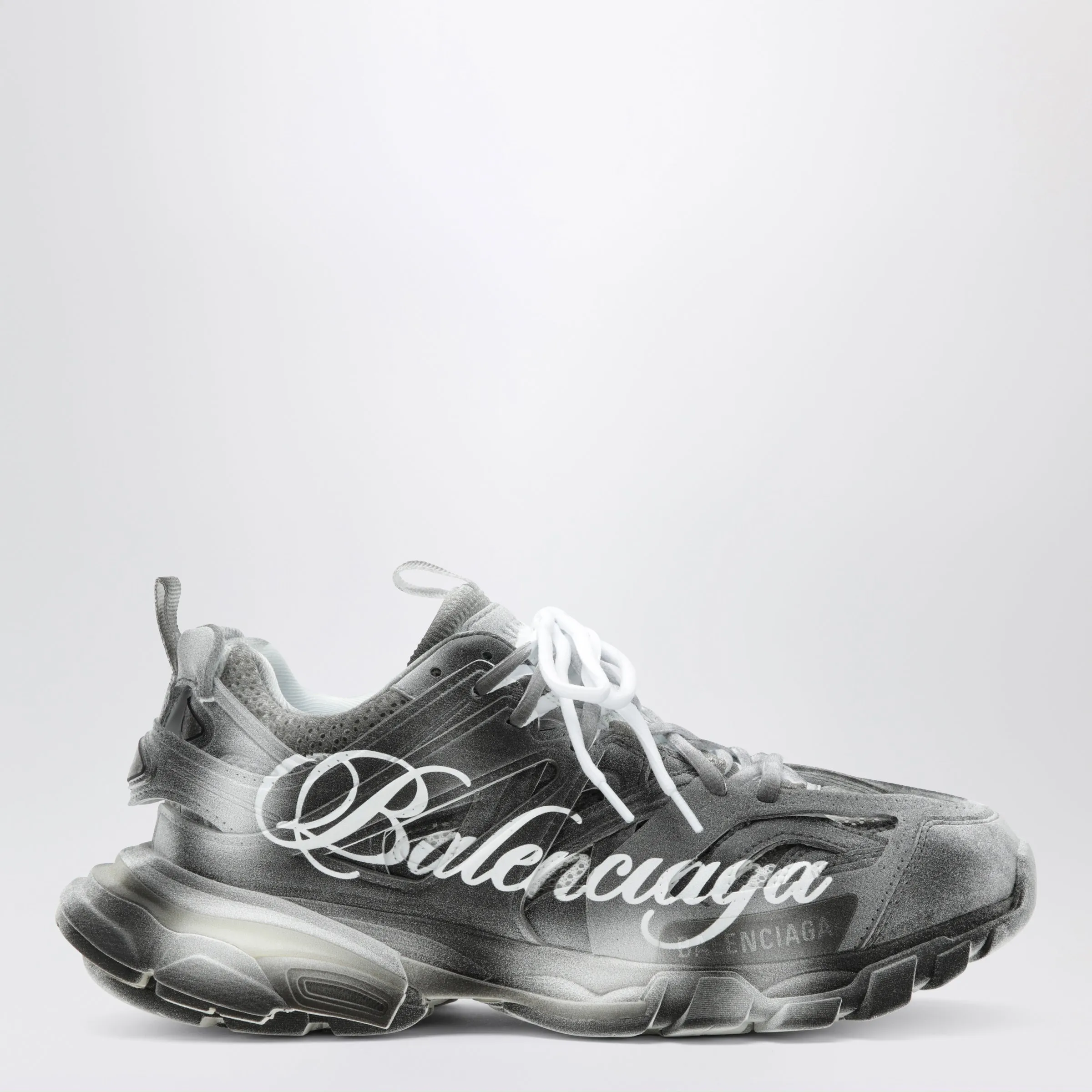Track Stencil Logo Sneakers In Black/White sold by Wanan Luxury