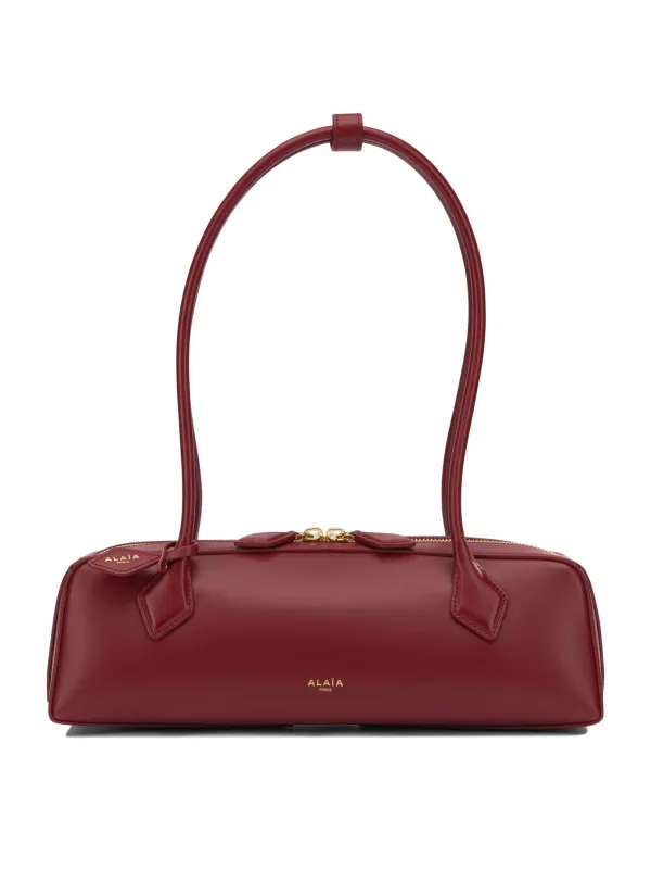 Le Teckel Shoulder Bags Red made by Alaia