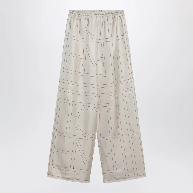 Ivory Silk Trousers With Monogram made by Toteme