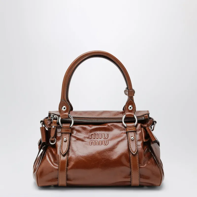 Medium Top-Handle Bag In Glossy Palisander Leather made by Miu Miu