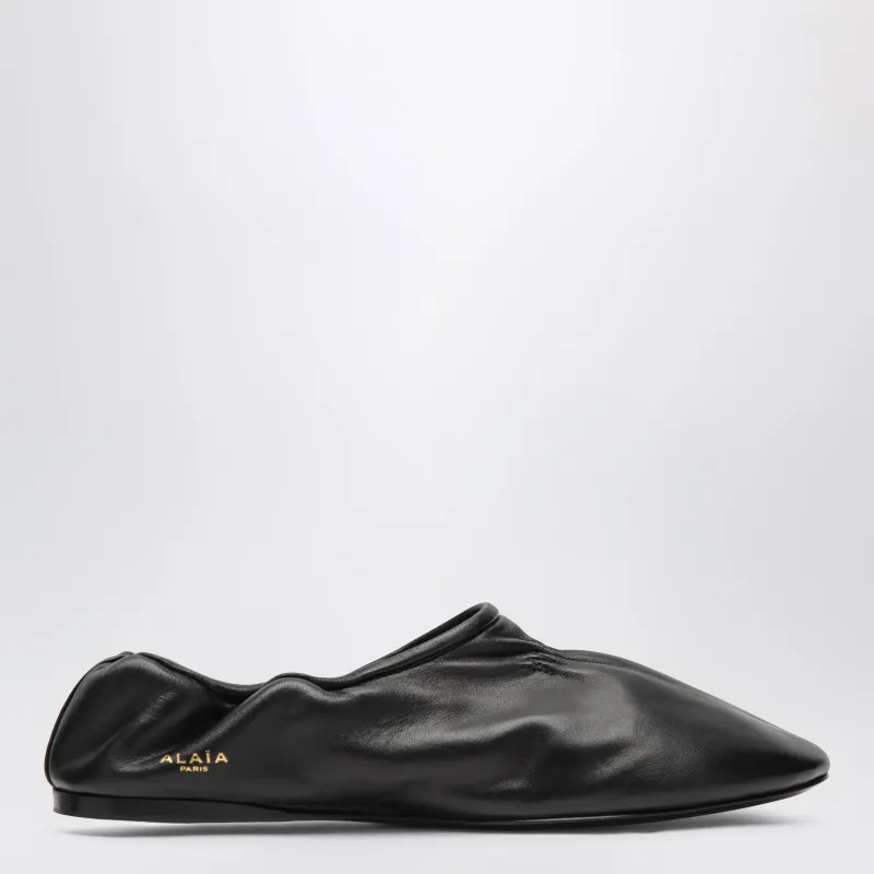 Soft Slippers In Black Leather made by Alaia