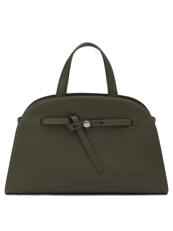 Handbags Green made by Tory Burch