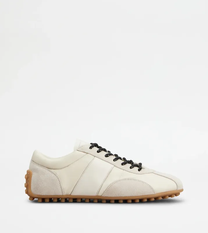 Sneakers & Slip-On White made by Tod's