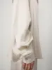 The Long Sleeved Button-Up Shirt sold by Lisa Yang