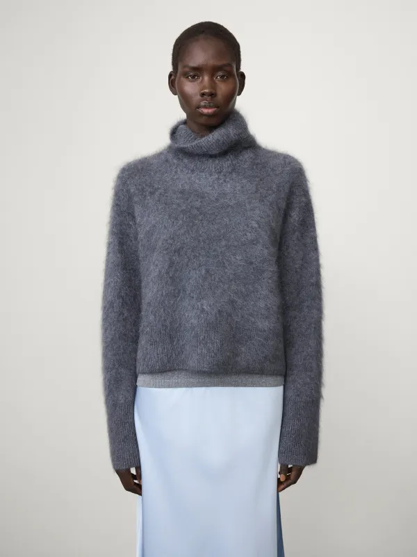 The Floren Sweater sold by Lisa Yang