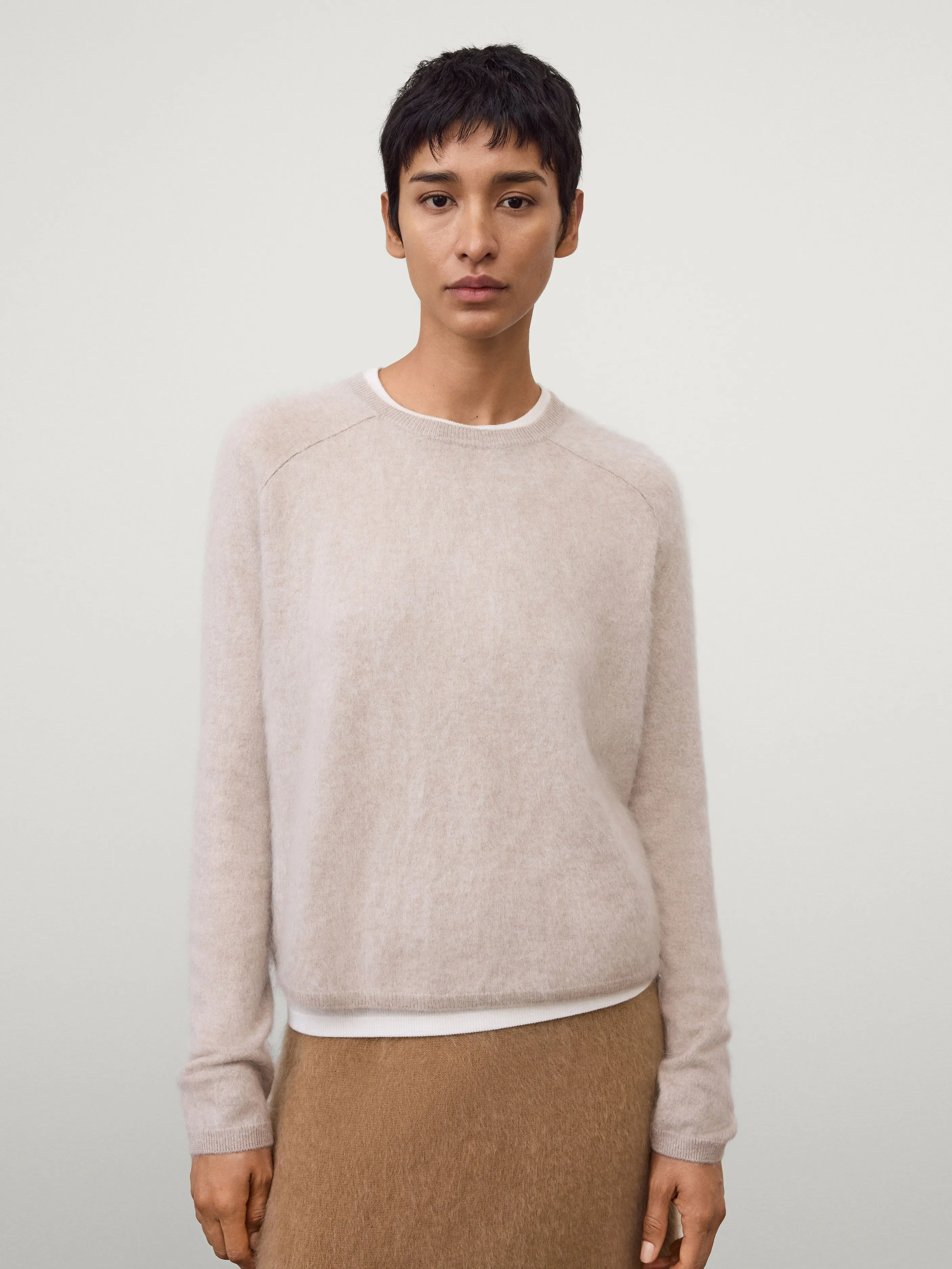 The Lexia Sweater sold by Lisa Yang