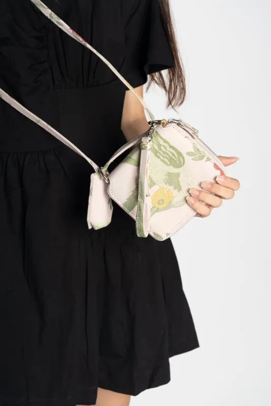 BIRD BROCADE WALLET BAG WITH FEATHER STRAP made by Marques ’ Almeida