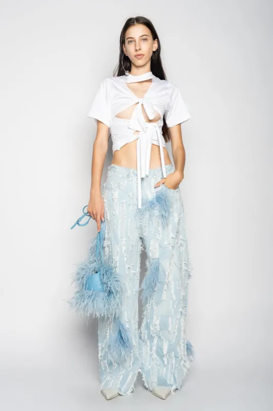 BOYFRIEND TROUSERS IN SHREDDED LIGHT BLUE DENIM sold by Marques ’ Almeida