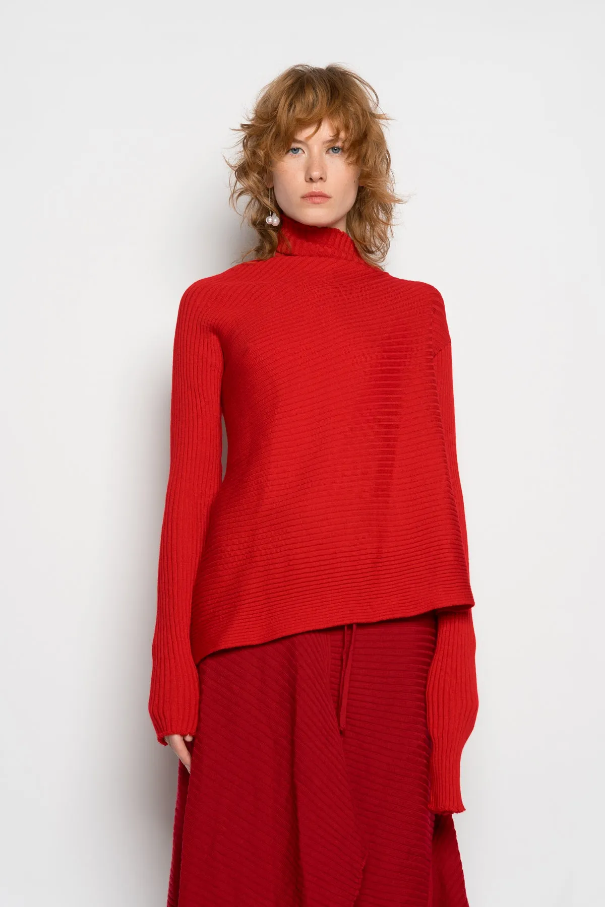 RED MERINO DRAPED JUMPER sold by Marques ’ Almeida
