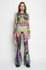 GRAFFITI PRINT MESH TROUSERS sold by Marques ’ Almeida
