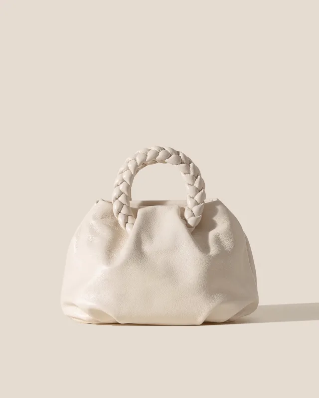 BOMBON M SUPPLE SHINY - Medium Plaited-handle Leather Handbag made by Hereu Studio