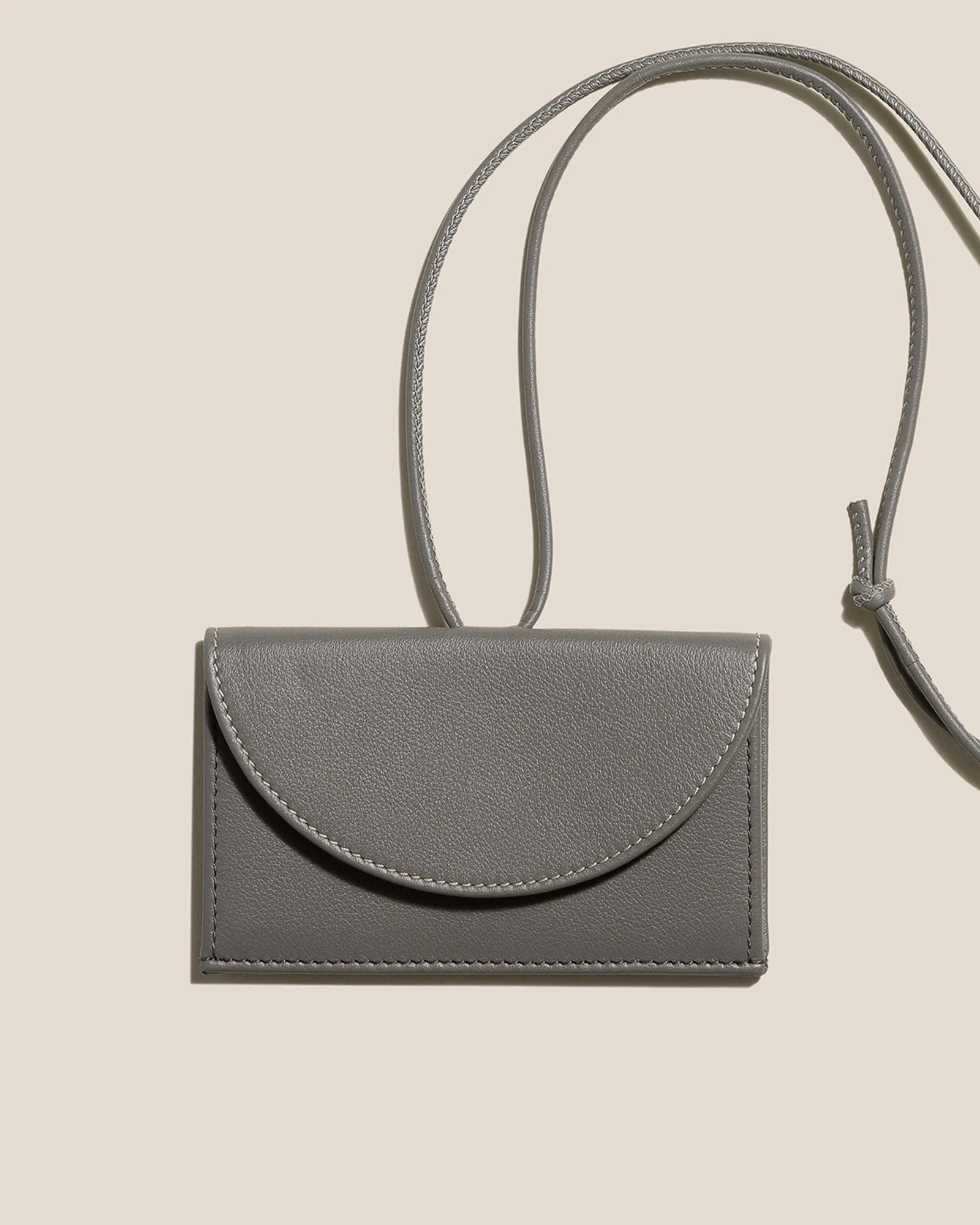 PENJAT - Leather Wallet with Strap sold by Hereu Studio