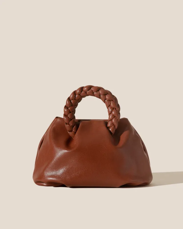 BOMBON M SUPPLE SHINY - Medium Plaited-handle Leather Handbag made by Hereu Studio