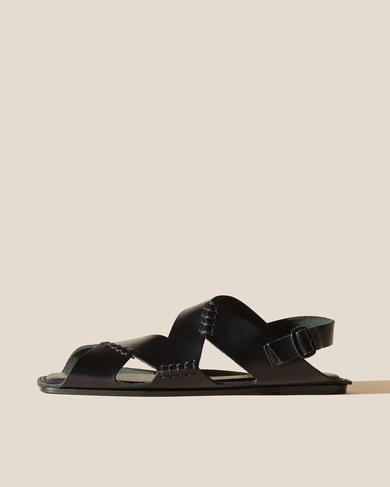 SUSET - Flat Asymmetrical Sandal sold by Hereu Studio