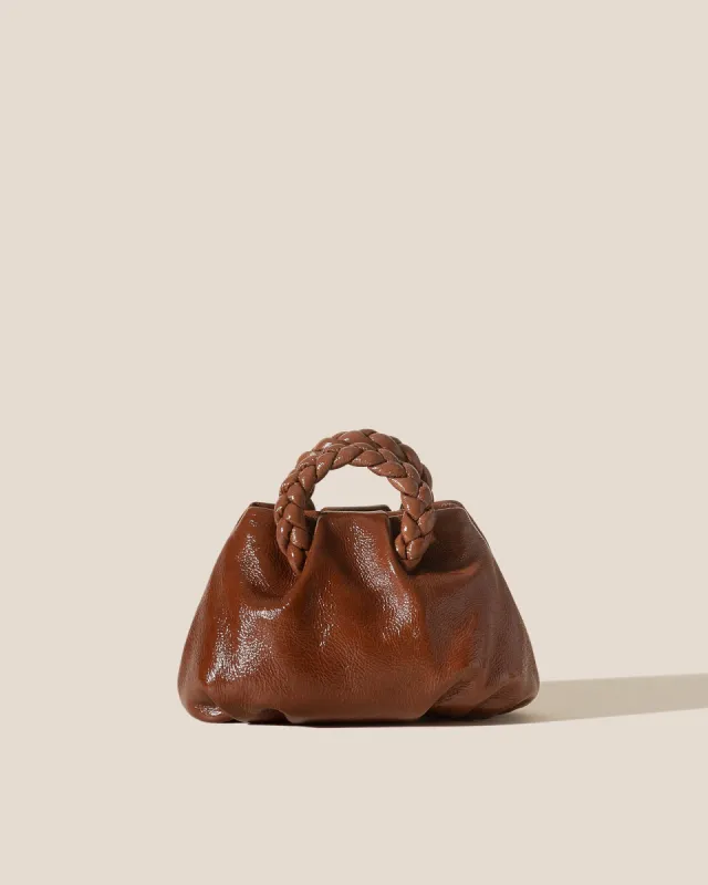BOMBON CRINKLED GLOSSY - Plaited-handle Leather Handbag sold by Hereu Studio
