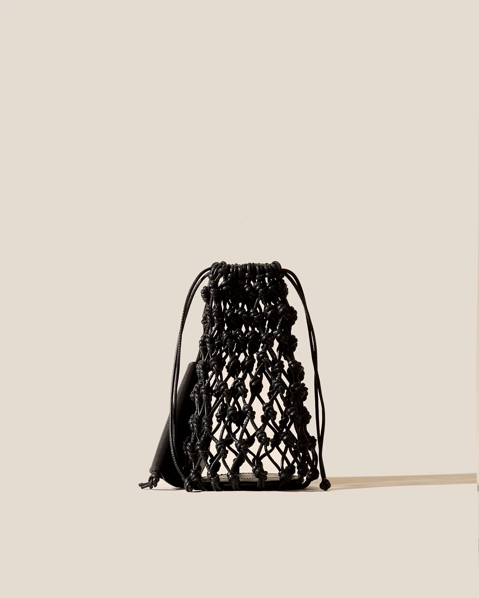 FILAT - Knotted Mini Drawstring Tote Bag sold by Hereu Studio