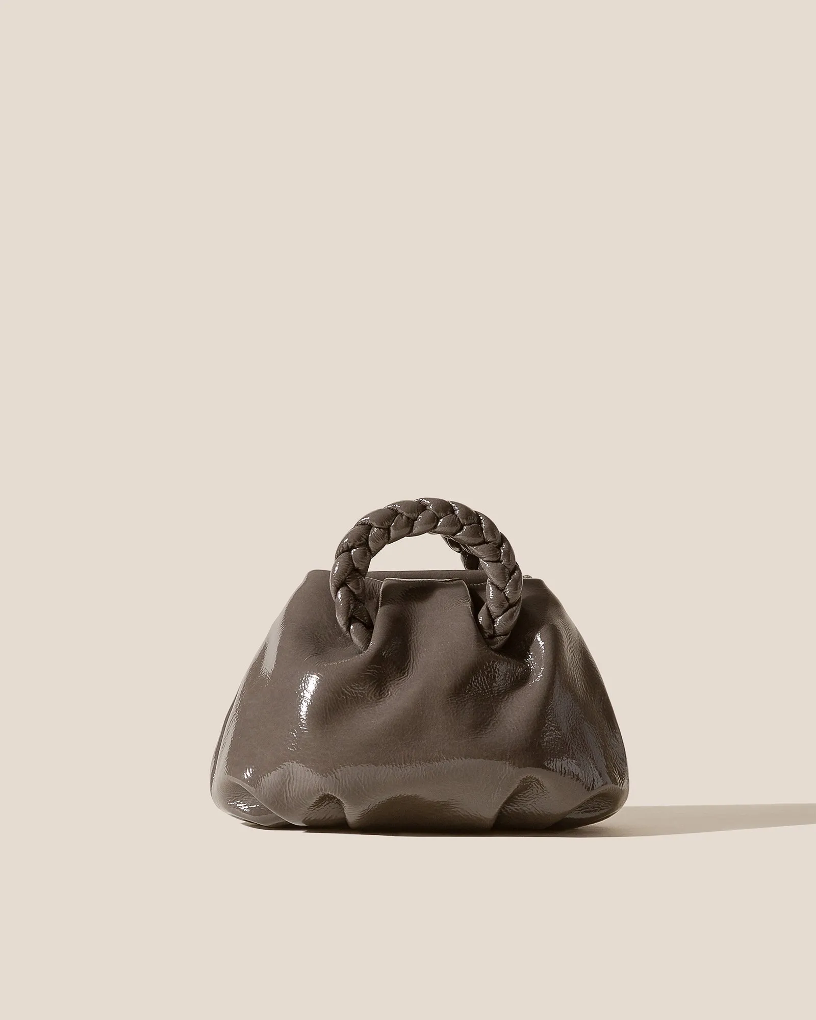 BOMBON CRINKLED GLOSSY - Small Plaited-handle Leather Crossbody Bag sold by Hereu Studio