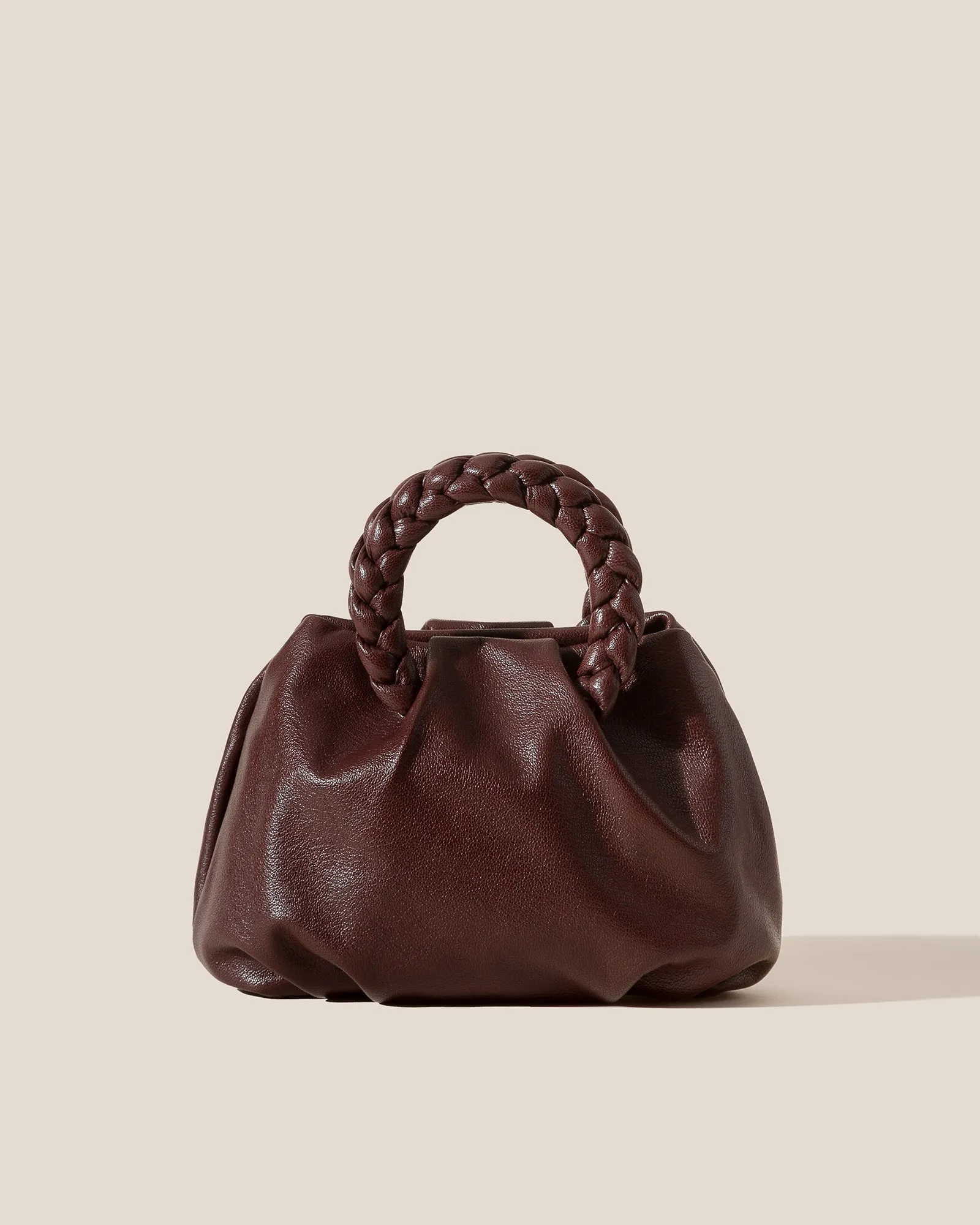 BOMBON M SUPPLE SHINY - Plaited-handle Leather Crossbody Bag sold by Hereu Studio