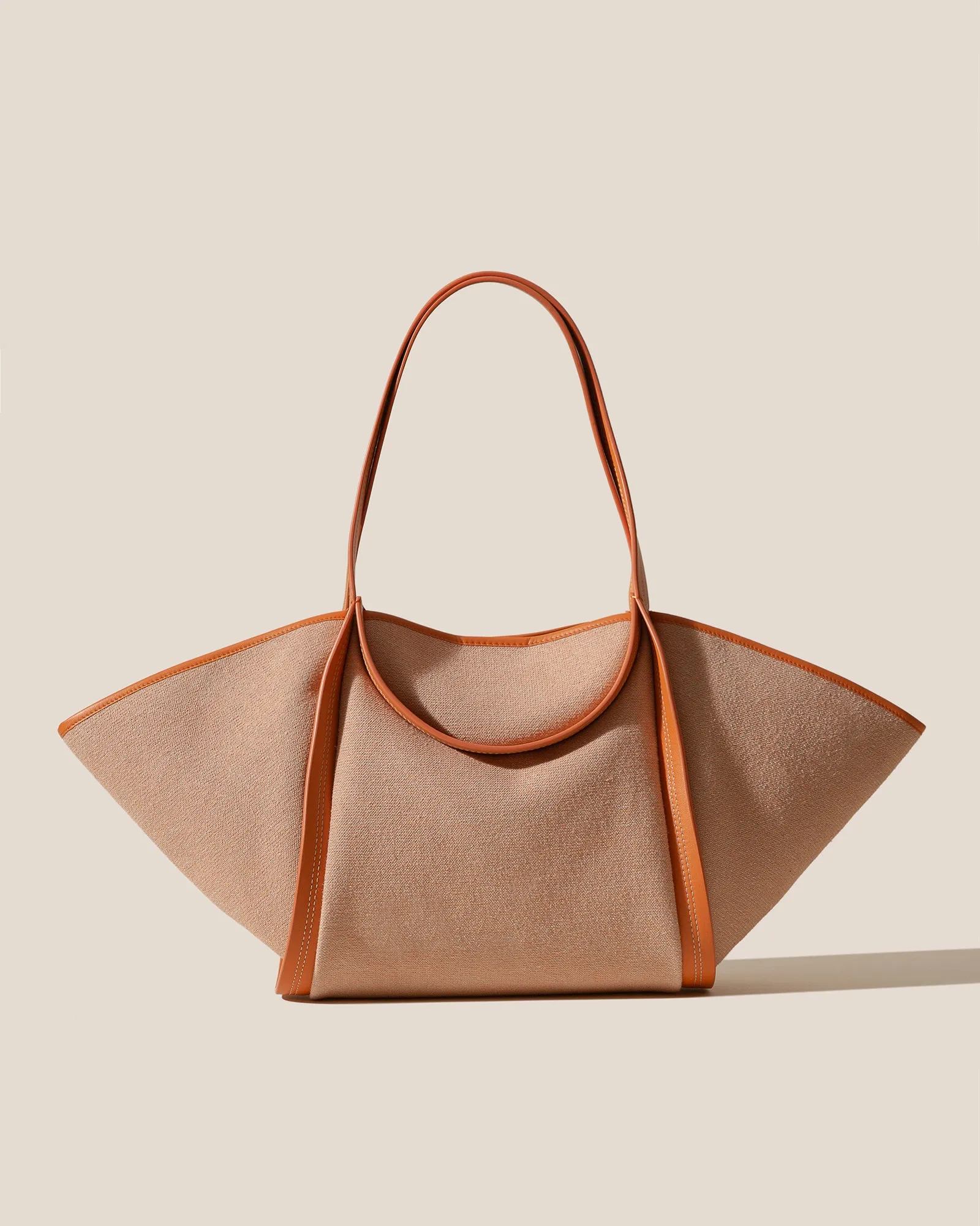 CUBER - Leather-Trimmed Canvas Basket sold by Hereu Studio