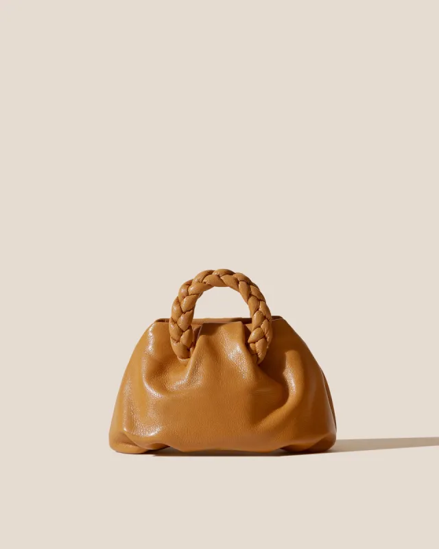 BOMBON SUPPLE SHINY - Plaited-handle Leather Handbag sold by Hereu Studio
