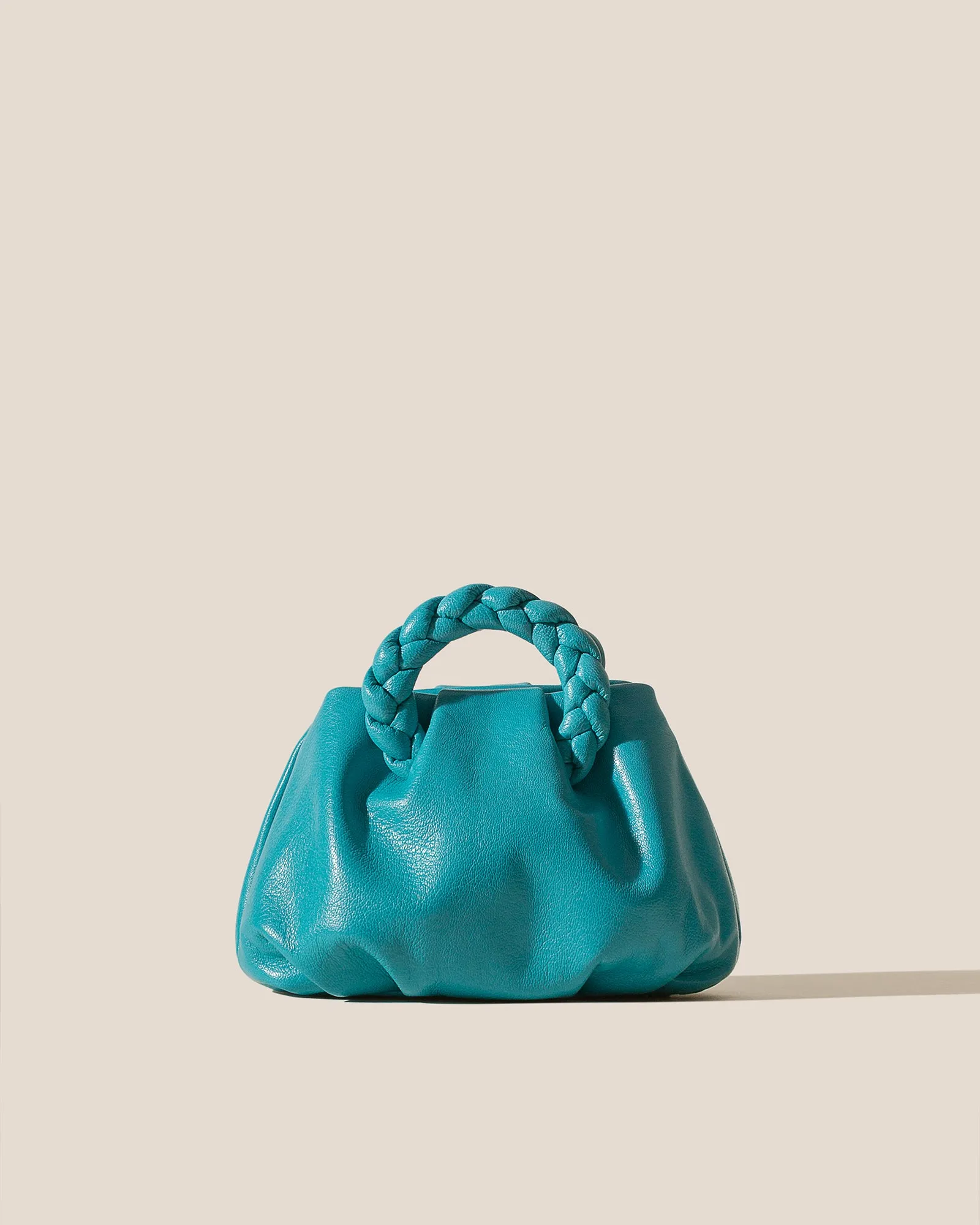 BOMBON SUPPLE SHINY - Plaited-handle Leather Handbag sold by Hereu Studio